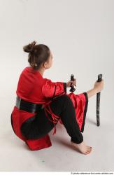 Katerina Ninja Kneeling Pose